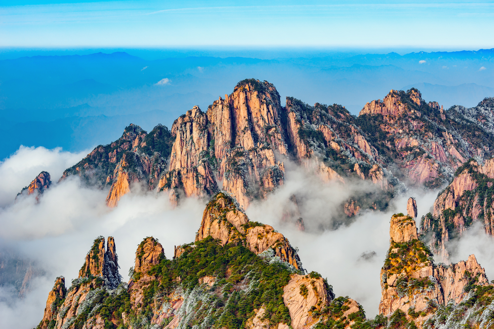 Huangshan National Park rugged mountains with rolling clouds